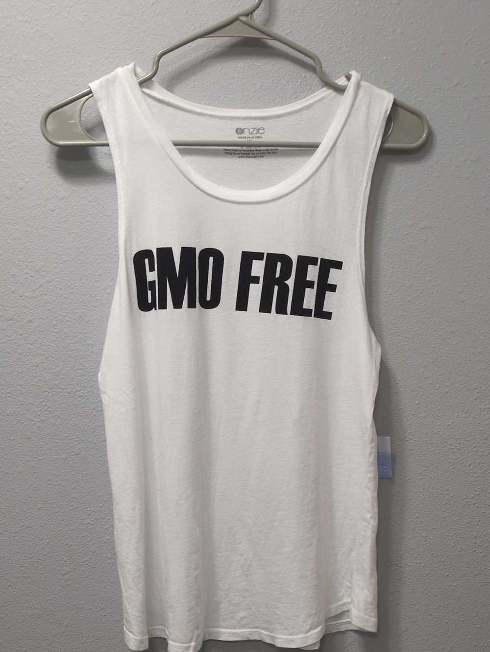 Onzie White Tank with Bold Black "GMO FREE" Graphic